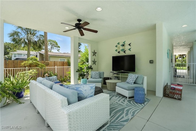 719 Park Ave, Naples, FL 34110 - living area featuring ceiling fan, finished concrete flooring, and recessed lighting