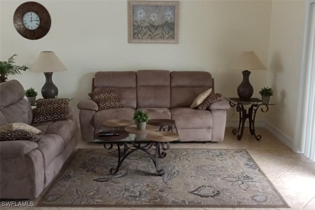 902 Mcarthur Ave, Lehigh Acres, FL 33936 - living area with tile patterned flooring and baseboards