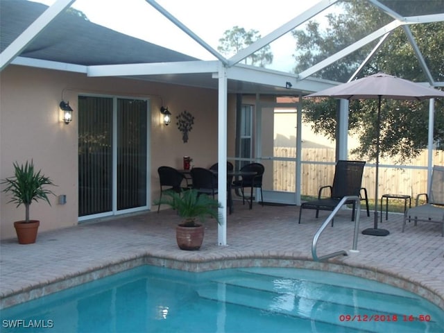 902 Mcarthur Ave, Lehigh Acres, FL 33936 - view of pool with a patio area and glass enclosure