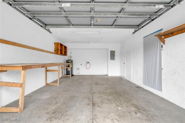 4508/4510 30th St SW, Lehigh Acres, FL 33973 - garage with water heater and electric panel