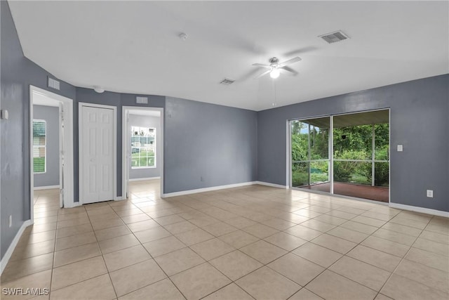 4508/4510 30th St SW, Lehigh Acres, FL 33973 - empty room featuring light tile patterned floors and a ceiling fan