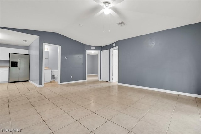 4508/4510 30th St SW, Lehigh Acres, FL 33973 - unfurnished room with vaulted ceiling, ceiling fan, and light tile patterned floors