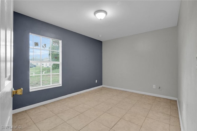4508/4510 30th St SW, Lehigh Acres, FL 33973 - tiled empty room with baseboards