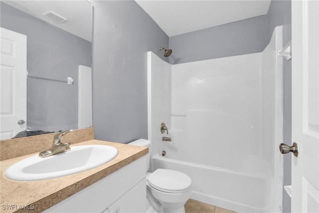 4508/4510 30th St SW, Lehigh Acres, FL 33973 - full bathroom featuring vanity,  shower combination, and tile patterned flooring