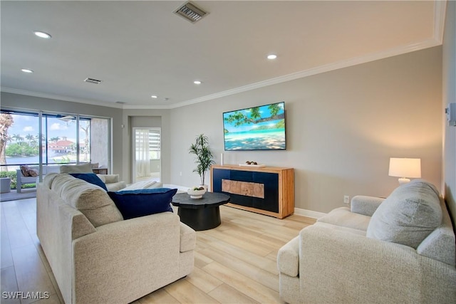 28601 Firenze Way Unit 102, Bonita Springs, FL 34135 - living room with recessed lighting, ornamental molding, and light wood-style floors