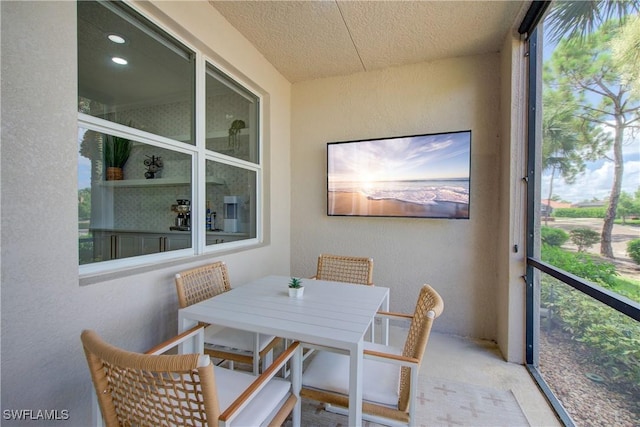 28601 Firenze Way Unit 102, Bonita Springs, FL 34135 - sunroom featuring healthy amount of natural light