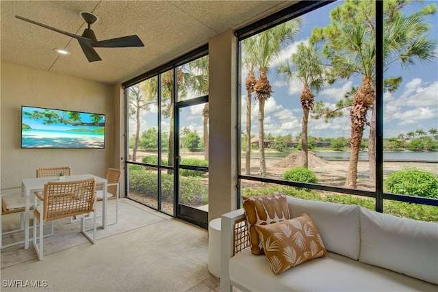 28601 Firenze Way Unit 102, Bonita Springs, FL 34135 - sunroom / solarium with a ceiling fan and a water view