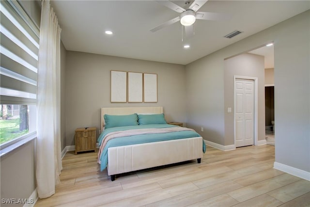 28601 Firenze Way Unit 102, Bonita Springs, FL 34135 - bedroom featuring light wood-style flooring, recessed lighting, and ceiling fan