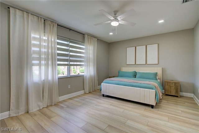 28601 Firenze Way Unit 102, Bonita Springs, FL 34135 - bedroom featuring wood finished floors, recessed lighting, and a ceiling fan
