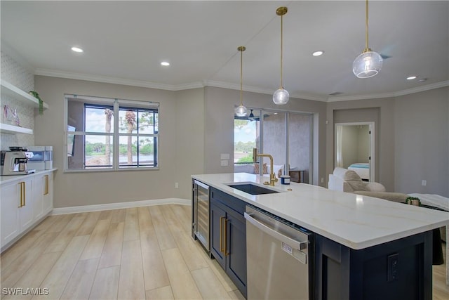 28601 Firenze Way Unit 102, Bonita Springs, FL 34135 - kitchen with stainless steel dishwasher, beverage cooler, light wood-style floors, a kitchen island with sink, and recessed lighting