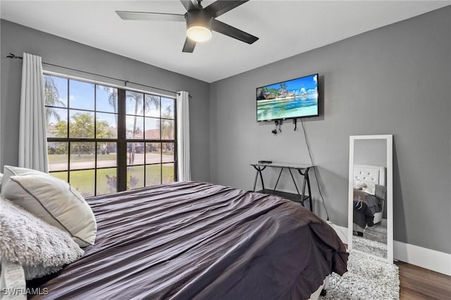 17971 Bermuda Dunes Dr, Fort Myers, FL 33967 - bedroom featuring wood finished floors and a ceiling fan