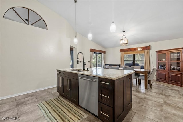 17971 Bermuda Dunes Dr, Fort Myers, FL 33967 - kitchen featuring dishwasher, vaulted ceiling, decorative light fixtures, light stone countertops, and dark brown cabinets