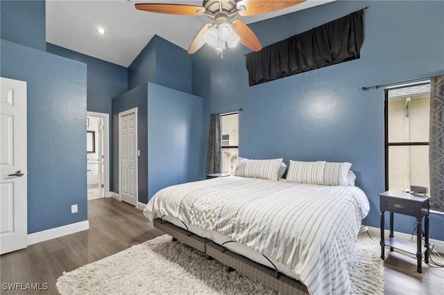 17971 Bermuda Dunes Dr, Fort Myers, FL 33967 - bedroom featuring high vaulted ceiling, wood finished floors, ensuite bath, ceiling fan, and a closet