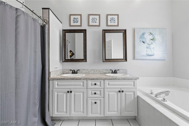 17971 Bermuda Dunes Dr, Fort Myers, FL 33967 - full bathroom featuring a bath, double vanity, tile patterned floors, and a shower with curtain