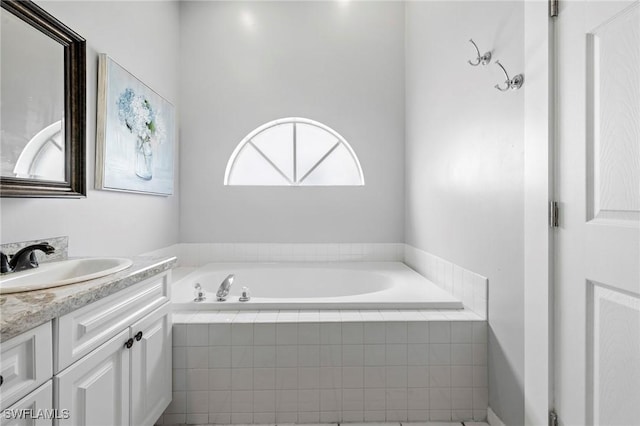 17971 Bermuda Dunes Dr, Fort Myers, FL 33967 - bathroom featuring a garden tub and vanity
