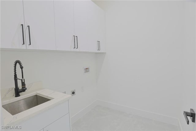 1803 Venice Ave N, Lehigh Acres, FL 33971 - washroom with electric dryer hookup, cabinet space, and washer hookup