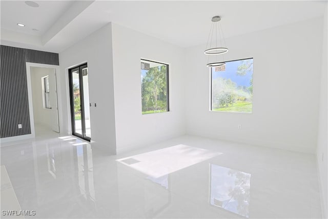 1803 Venice Ave N, Lehigh Acres, FL 33971 - tiled spare room with baseboards and recessed lighting