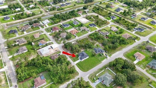 1803 Venice Ave N, Lehigh Acres, FL 33971 - aerial view of property's location with nearby suburban area