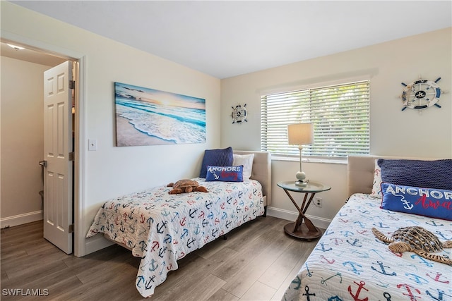4622 SW 10th Ave, Cape Coral, FL 33914 - bedroom with wood finished floors and baseboards