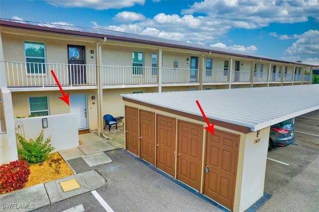 16251 Dublin Cir Unit F101, Fort Myers, FL 33908 - view of home's community featuring uncovered parking