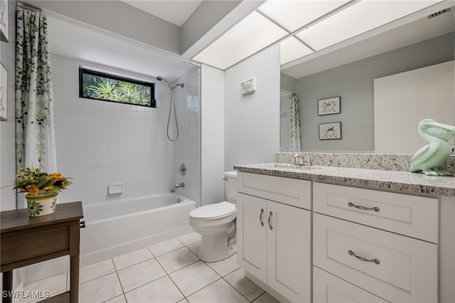 bathroom with vanity, shower / tub combo with curtain, and tile patterned flooring