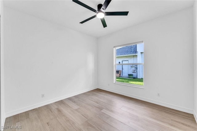 2313 SE 20th Pl, Cape Coral, FL 33990 - spare room featuring wood finished floors and a ceiling fan