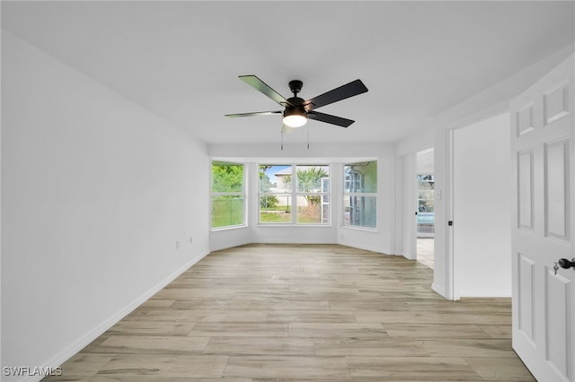 3307 Pinetree St, Port Charlotte, FL 33952 - unfurnished room with ceiling fan and light wood finished floors