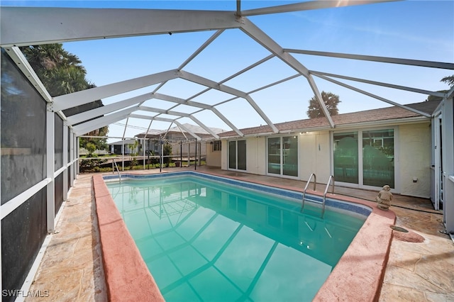 3307 Pinetree St, Port Charlotte, FL 33952 - outdoor pool with a patio area and glass enclosure