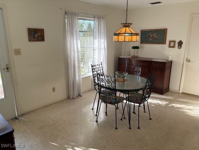4425 N Atlantic Cir, North Fort Myers, FL 33903 - dining space with baseboards