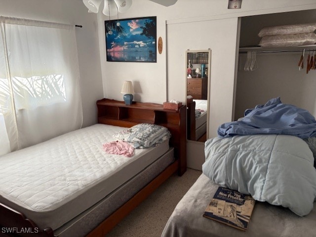 4425 N Atlantic Cir, North Fort Myers, FL 33903 - bedroom with a closet and a ceiling fan