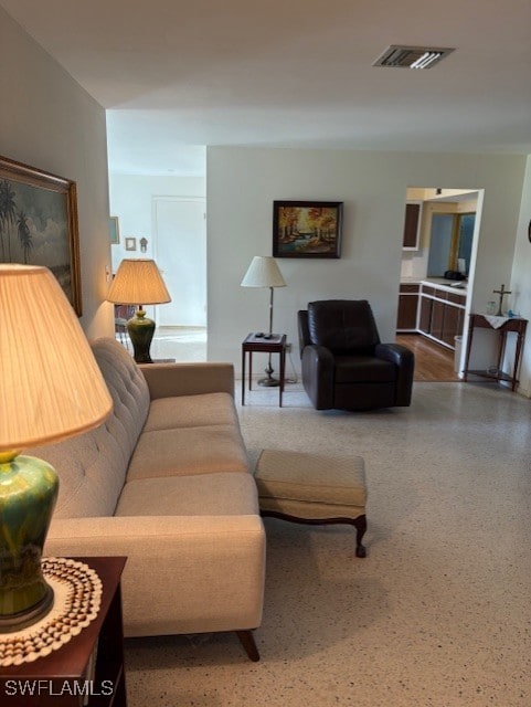 4425 N Atlantic Cir, North Fort Myers, FL 33903 - living room with speckle patterned floor