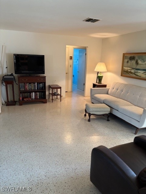 4425 N Atlantic Cir, North Fort Myers, FL 33903 - living area with speckle patterned floor