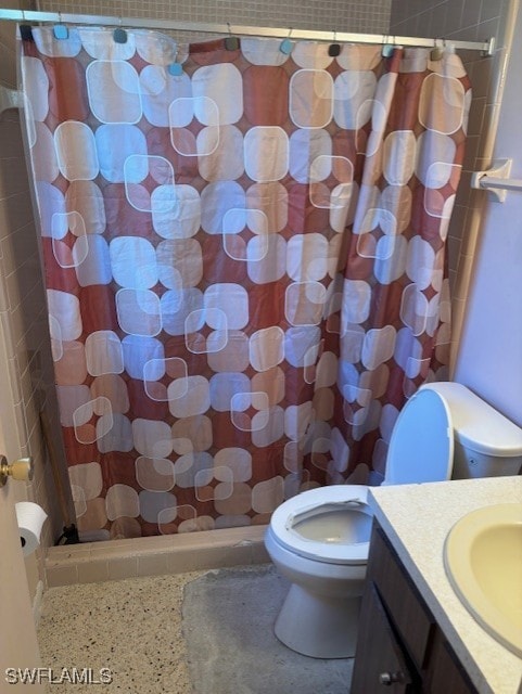 4425 N Atlantic Cir, North Fort Myers, FL 33903 - full bath with speckle patterned floor, vanity, and tiled shower