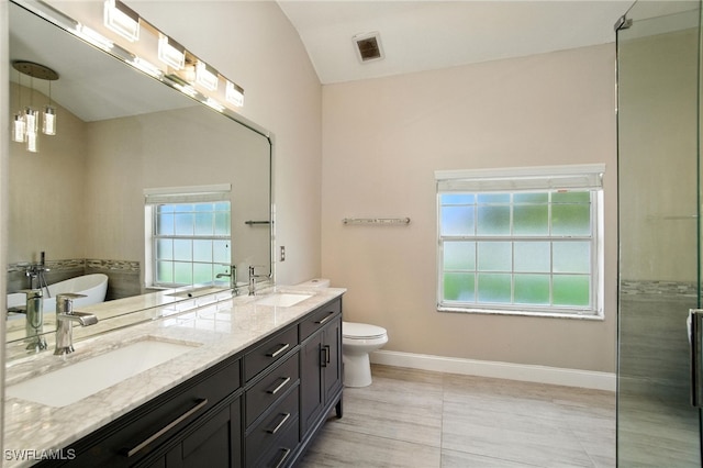 3271 Lemon Ln, Naples, FL 34120 - bathroom featuring a soaking tub, double vanity, a shower, and vaulted ceiling