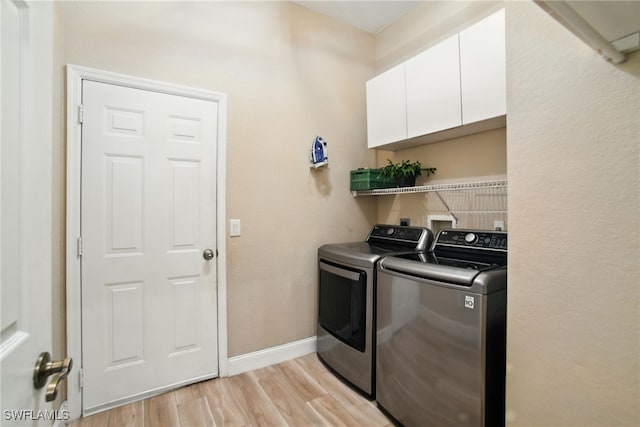 3271 Lemon Ln, Naples, FL 34120 - washroom with washing machine and clothes dryer, cabinet space, and light wood-style flooring