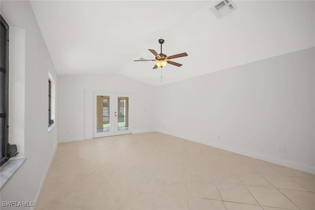 519 99th Ave N, Naples, FL 34108 - unfurnished room with french doors, lofted ceiling, and a ceiling fan