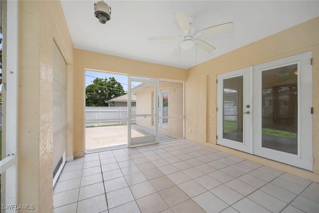519 99th Ave N, Naples, FL 34108 - unfurnished sunroom with french doors