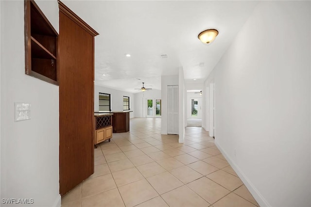 519 99th Ave N, Naples, FL 34108 - hallway featuring light tile patterned flooring and recessed lighting