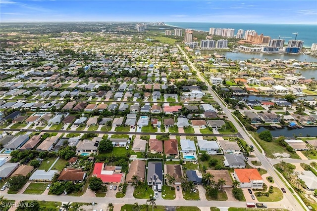 519 99th Ave N, Naples, FL 34108 - aerial view of property's location with a nearby body of water and nearby suburban area