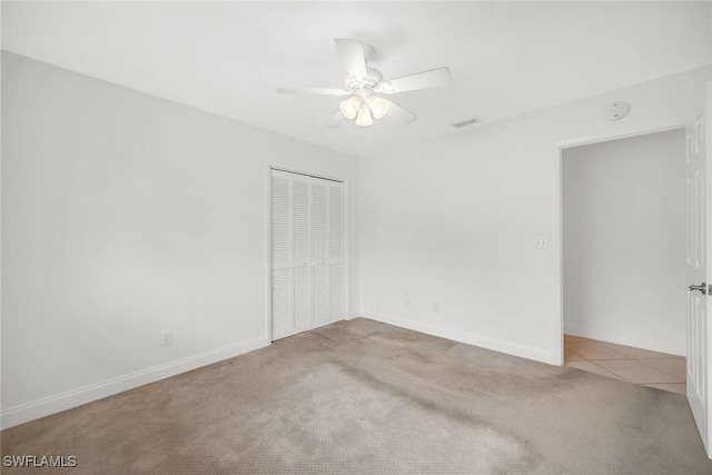 519 99th Ave N, Naples, FL 34108 - unfurnished room with carpet flooring and a ceiling fan