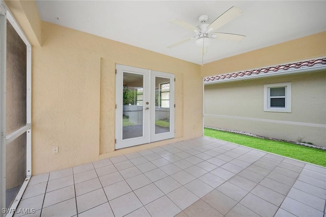 519 99th Ave N, Naples, FL 34108 - view of patio / terrace with french doors and a ceiling fan
