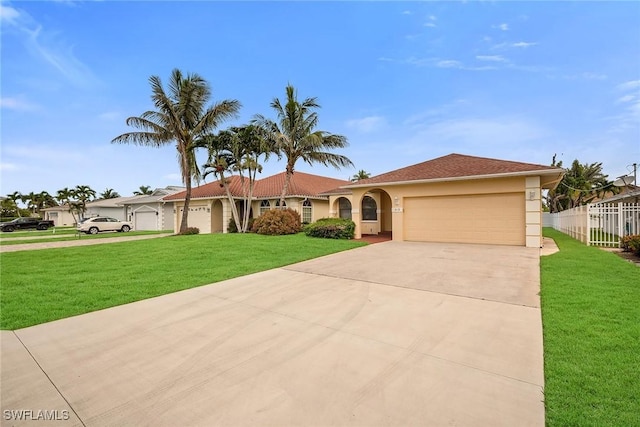 519 99th Ave N, Naples, FL 34108 - single story home featuring an attached garage, concrete driveway, and stucco siding