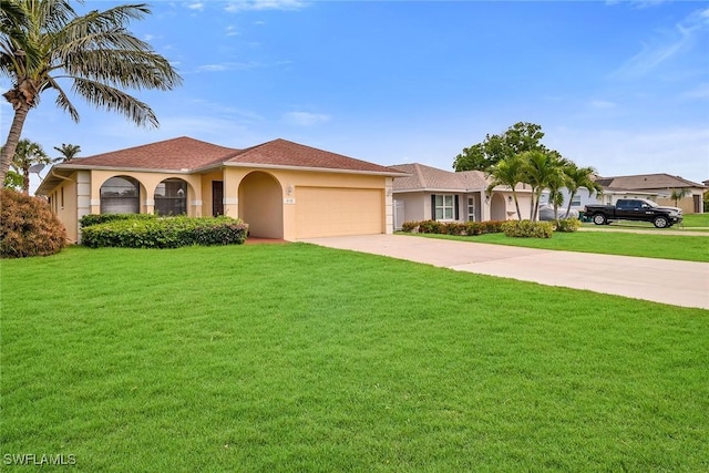519 99th Ave N, Naples, FL 34108 - view of front of property with a garage, concrete driveway, stucco siding, and a front yard