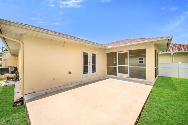 519 99th Ave N, Naples, FL 34108 - view of patio / terrace featuring french doors