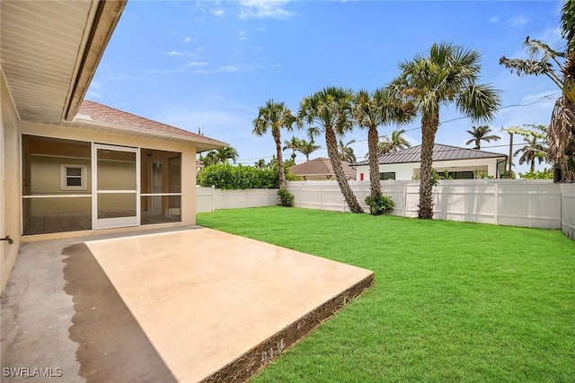 519 99th Ave N, Naples, FL 34108 - fenced backyard with a sunroom and a patio