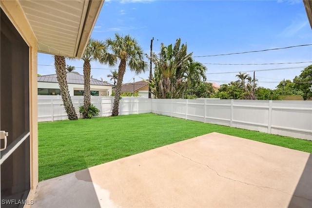 519 99th Ave N, Naples, FL 34108 - fenced backyard featuring a patio area