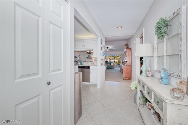 1140 Sarah Jean Cir Unit C-205, Naples, FL 34110 - hallway with light tile patterned floors and recessed lighting