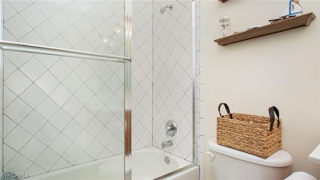 20029 Saraceno Dr, Estero, FL 33928 - bathroom with toilet and combined bath / shower with glass door