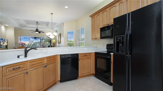 20029 Saraceno Dr, Estero, FL 33928 - kitchen featuring black appliances, light countertops, light tile patterned floors, a chandelier, and recessed lighting