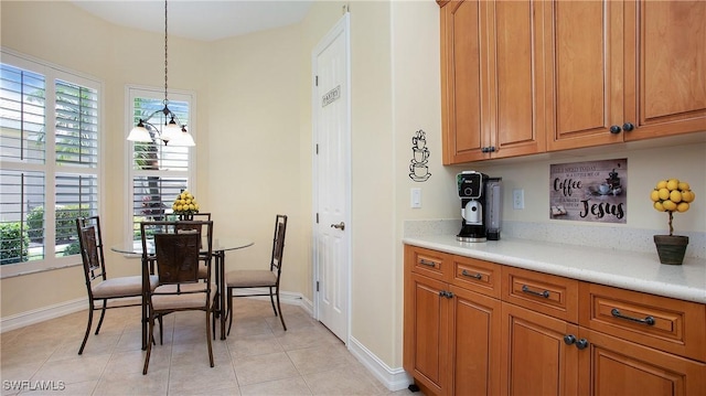 20029 Saraceno Dr, Estero, FL 33928 - dining space featuring baseboards and light tile patterned floors
